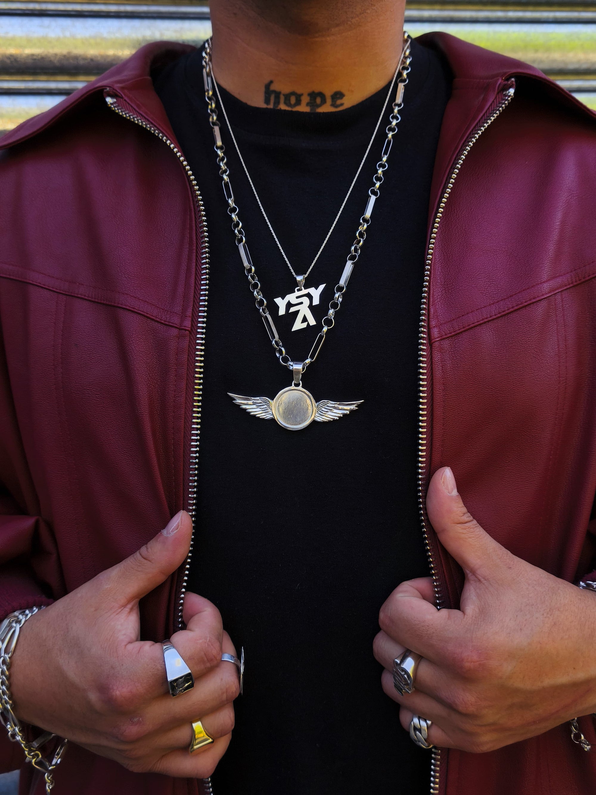 Colgante disco con alas