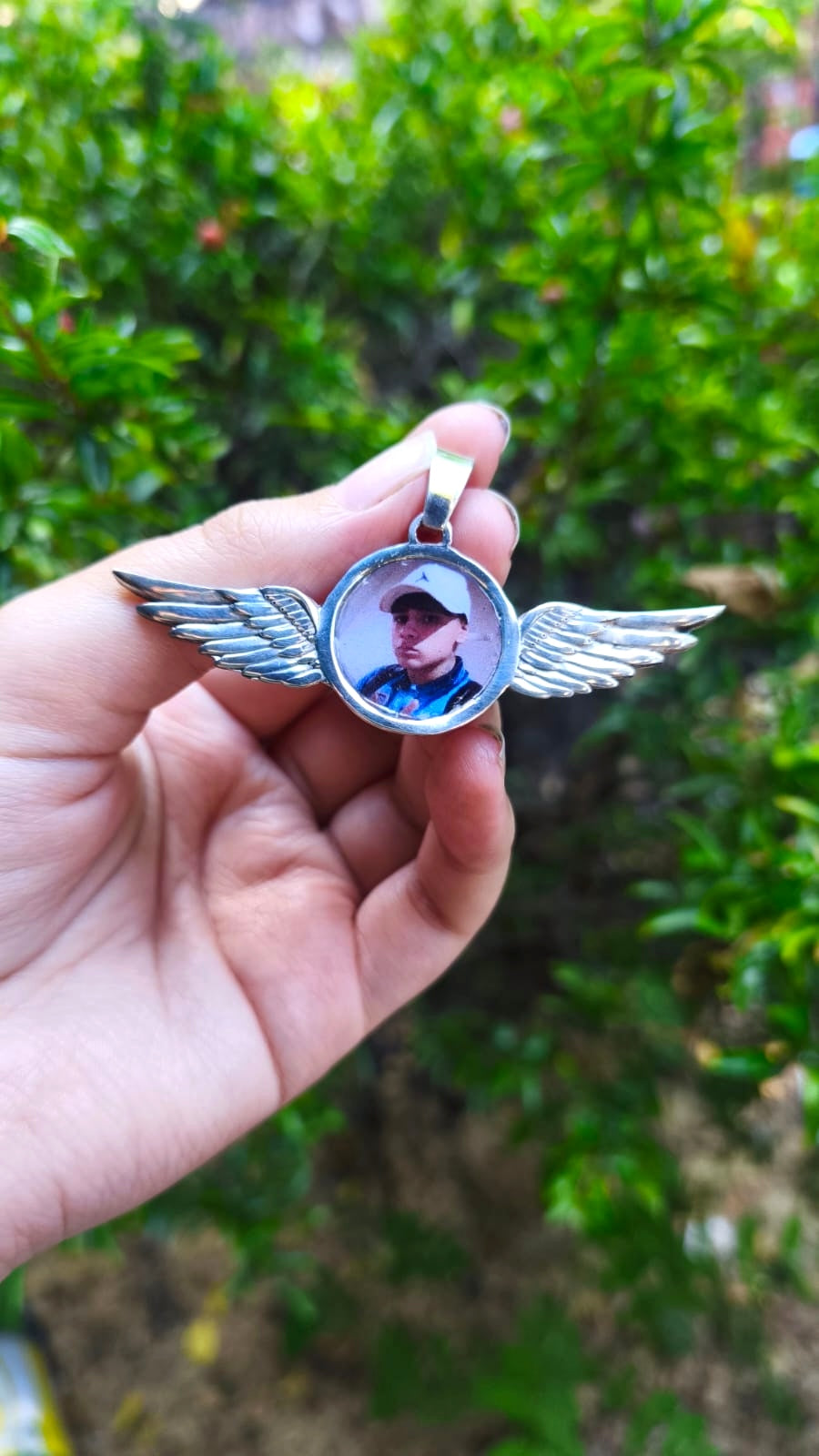 Colgante disco con alas